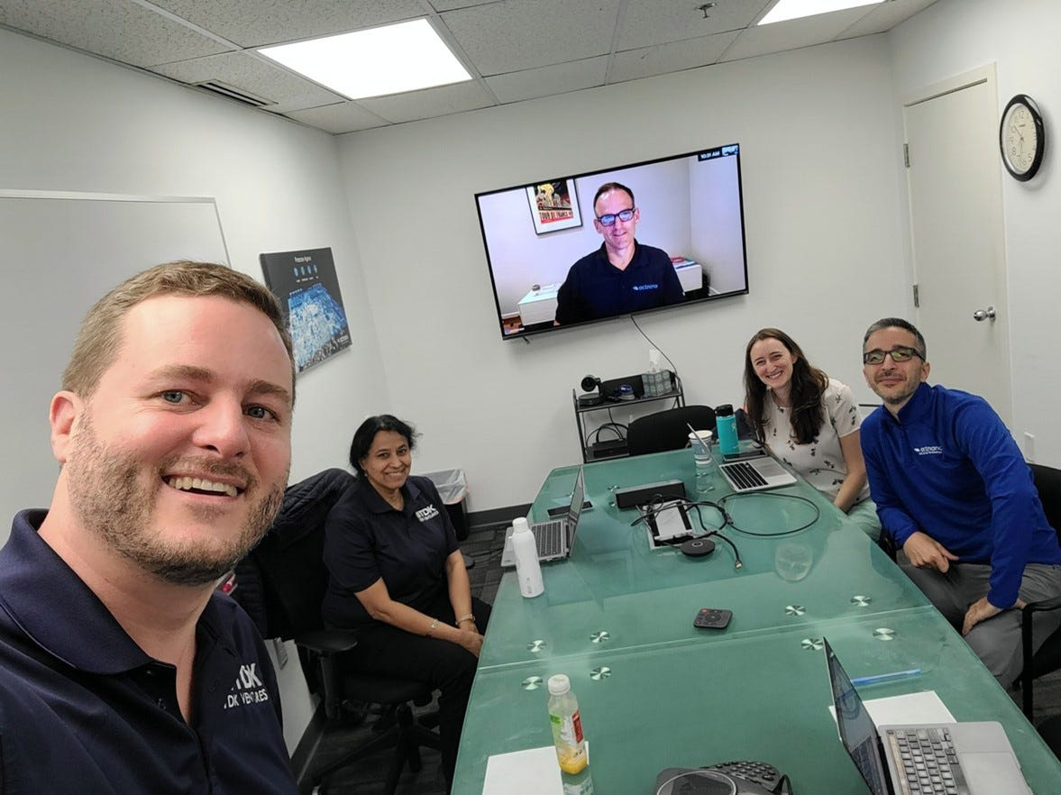 Nicolas Sauvage taking a selfie with the actnano team in a boardroom.