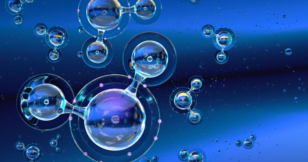 Transparent water bubbles with reflections on a blue gradient background.