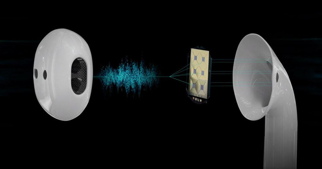 Close-up of earbuds illustrating audio transmission and sound wave technology.