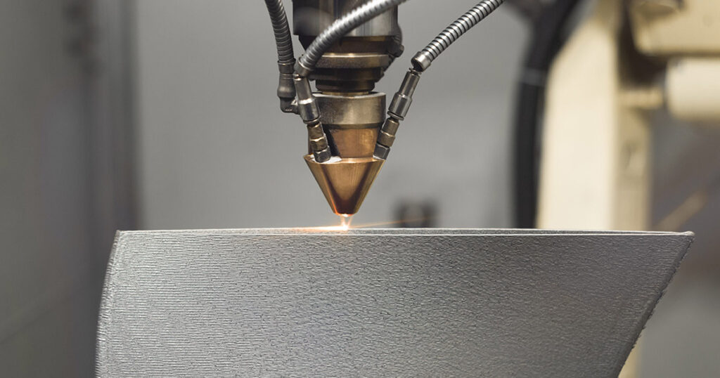 Close-up of industrial laser cutting machine precision work on metal.