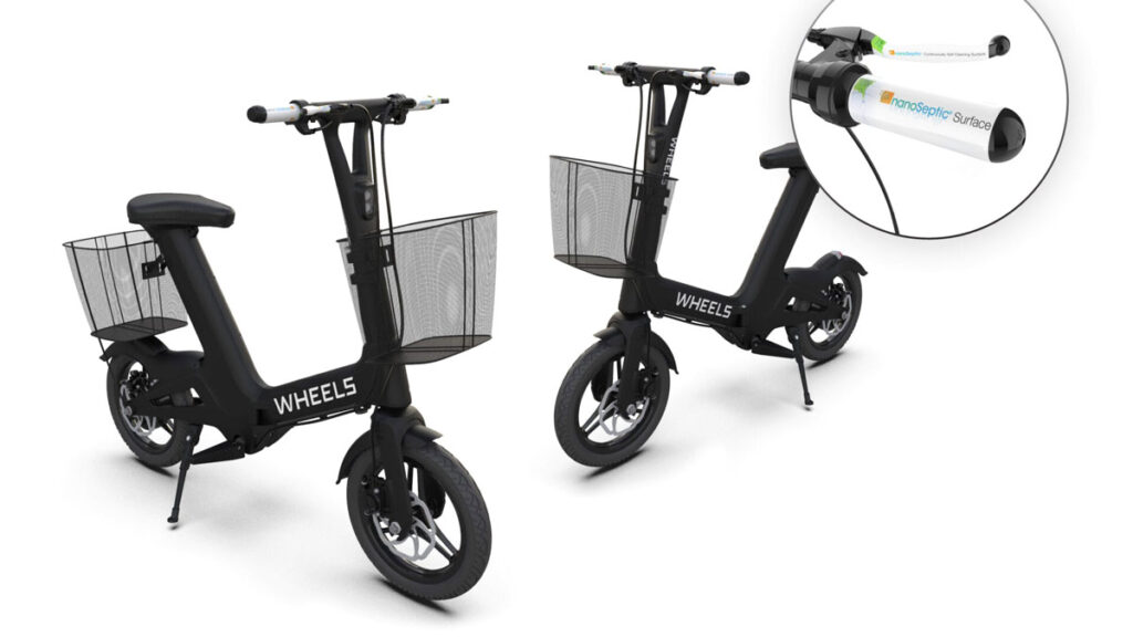 Black electric scooter with a basket and nano grip handle.