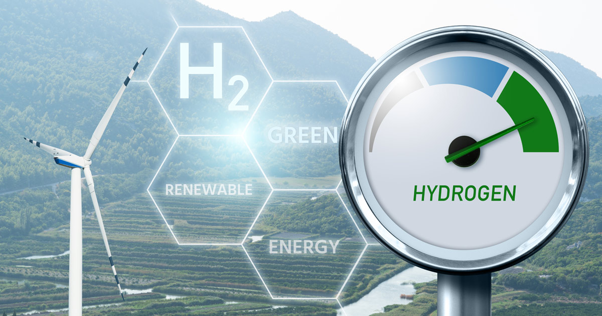 Conceptual image of green hydrogen production with wind turbine and energy gauge.