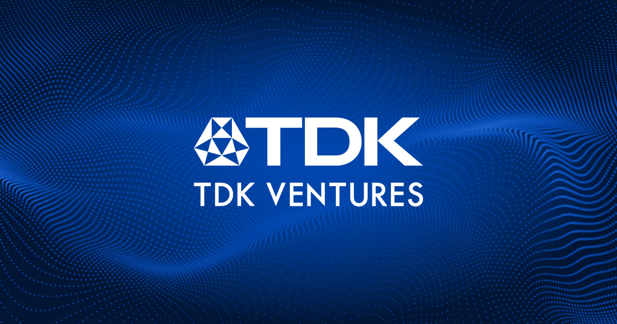 TDK Ventures logo on a blue wave background