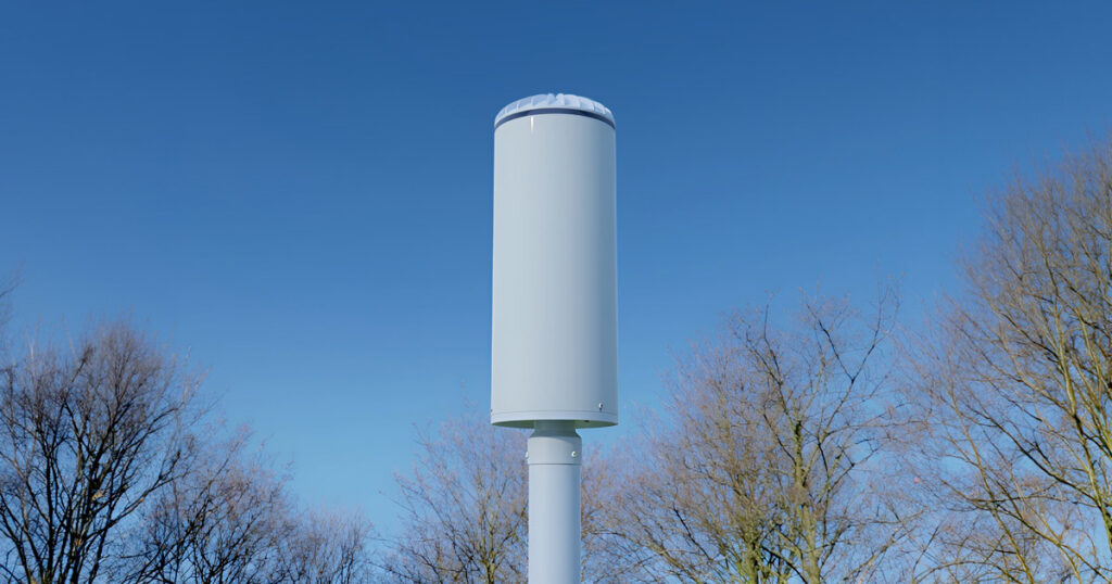 Verana 5G outdoor radio against a clear blue sky.